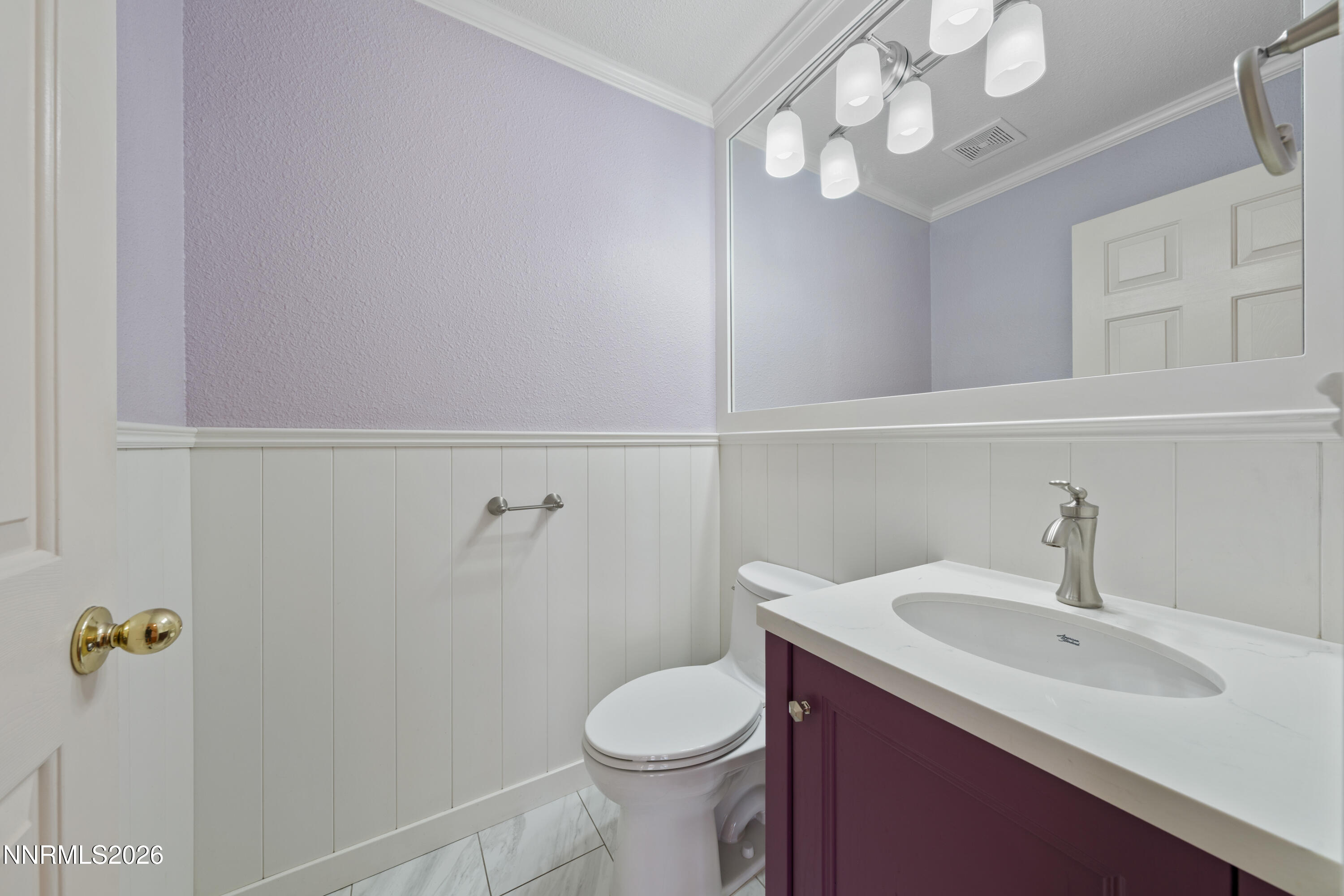 5524 Tappan Drive Reno, NV 89523 - Photo 6 of 70 a bathroom with a sink vanity mirror and toilet