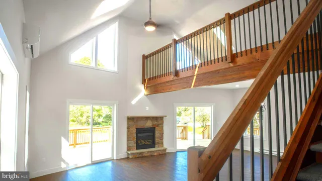 a view of an entryway with wooden floor