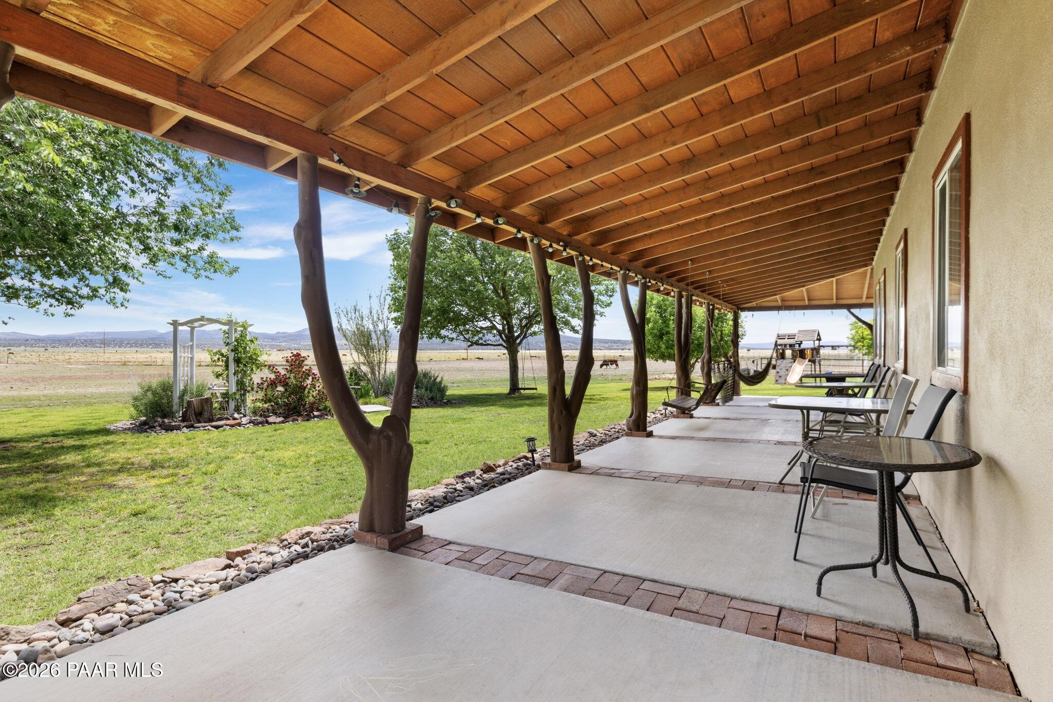 3900 West Runway Road Paulden, AZ 86334 - Photo 12 of 25 a view of a backyard with sitting area