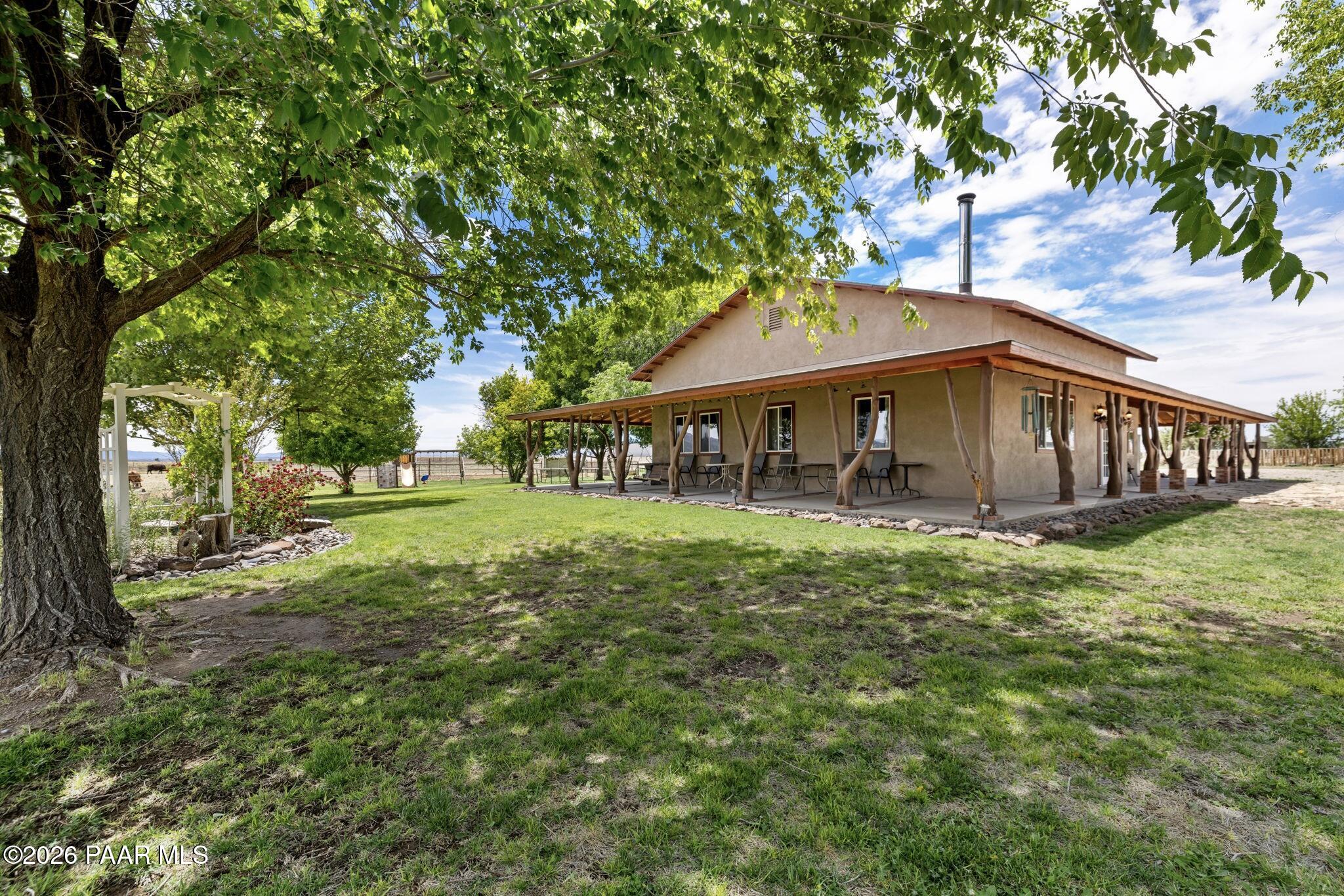 3900 West Runway Road Paulden, AZ 86334 - Photo 7 of 25 a view of a house with a yard