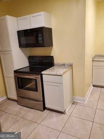 697 Grenada Terrace Macon, GA 31206 - Photo 13 of 18 a utility room with dryer and washer