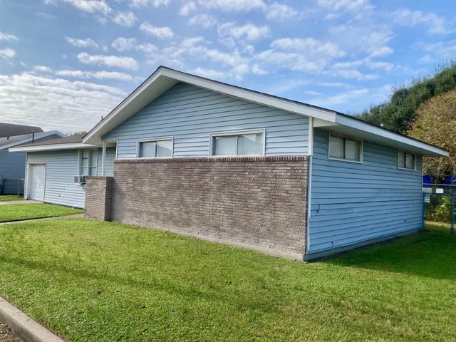 a view of a backyard with a garden