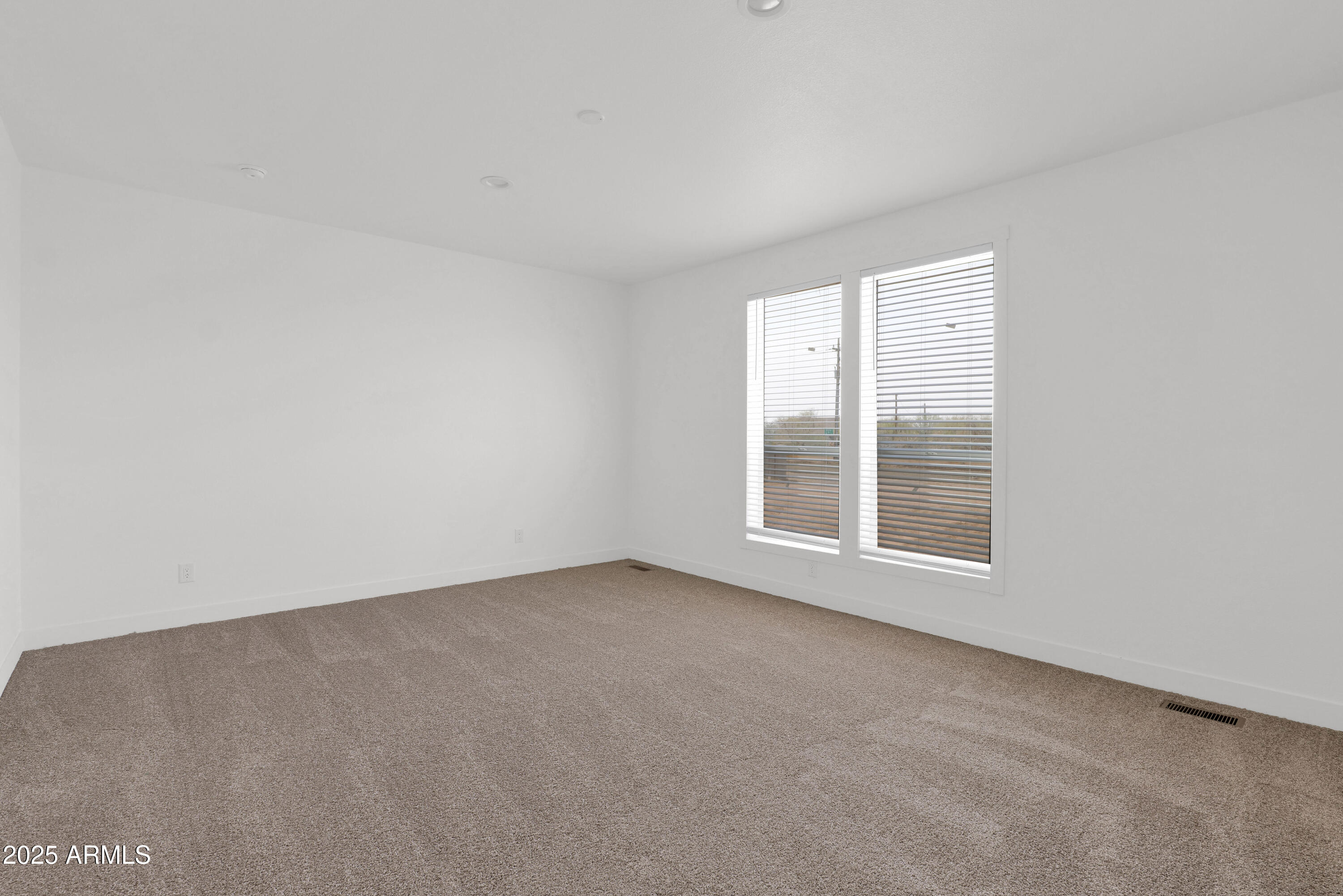 22367 North Royd Road Florence, AZ 85132 - Photo 11 of 22 an empty room with a window