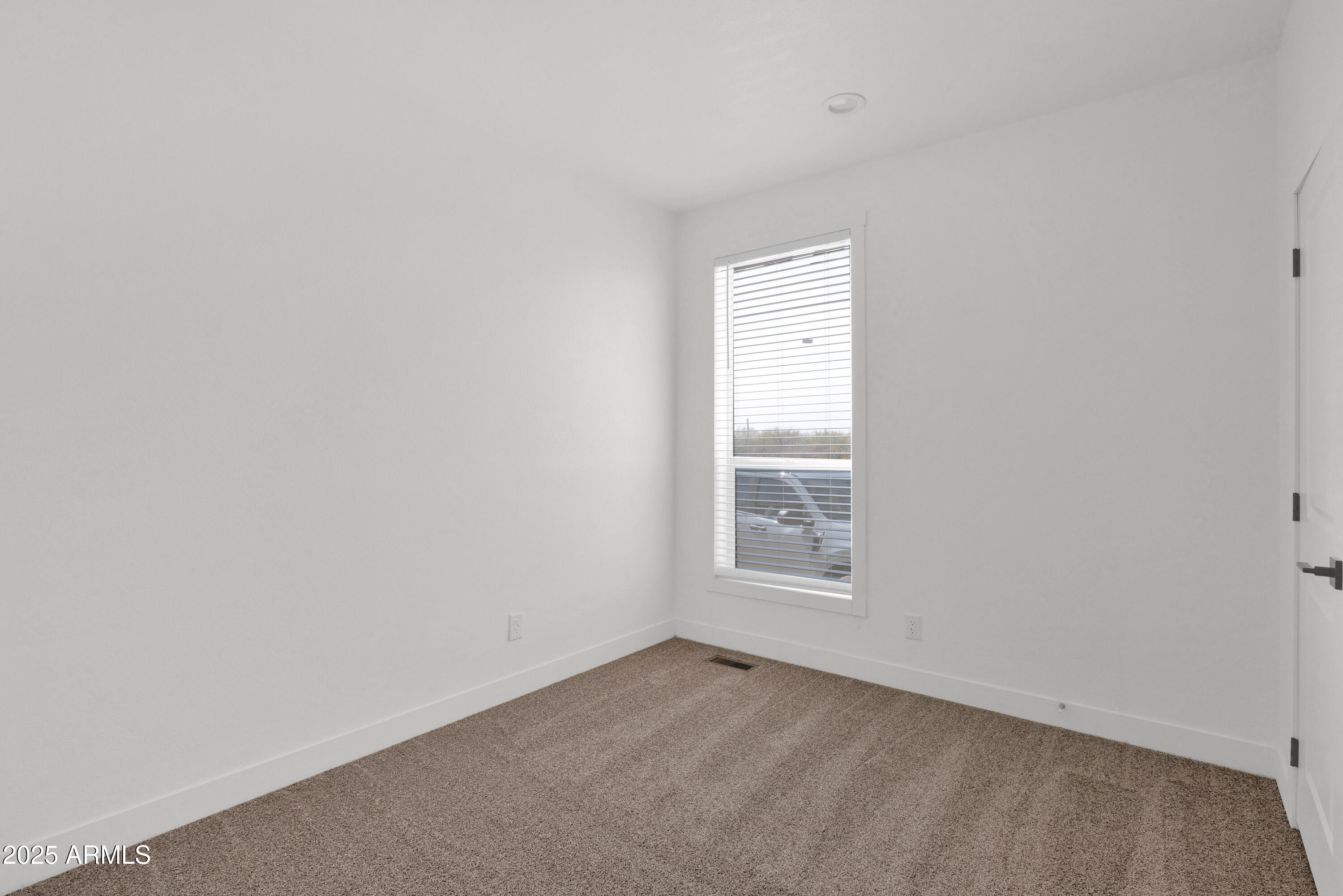 22367 North Royd Road Florence, AZ 85132 - Photo 14 of 22 an empty room with a window