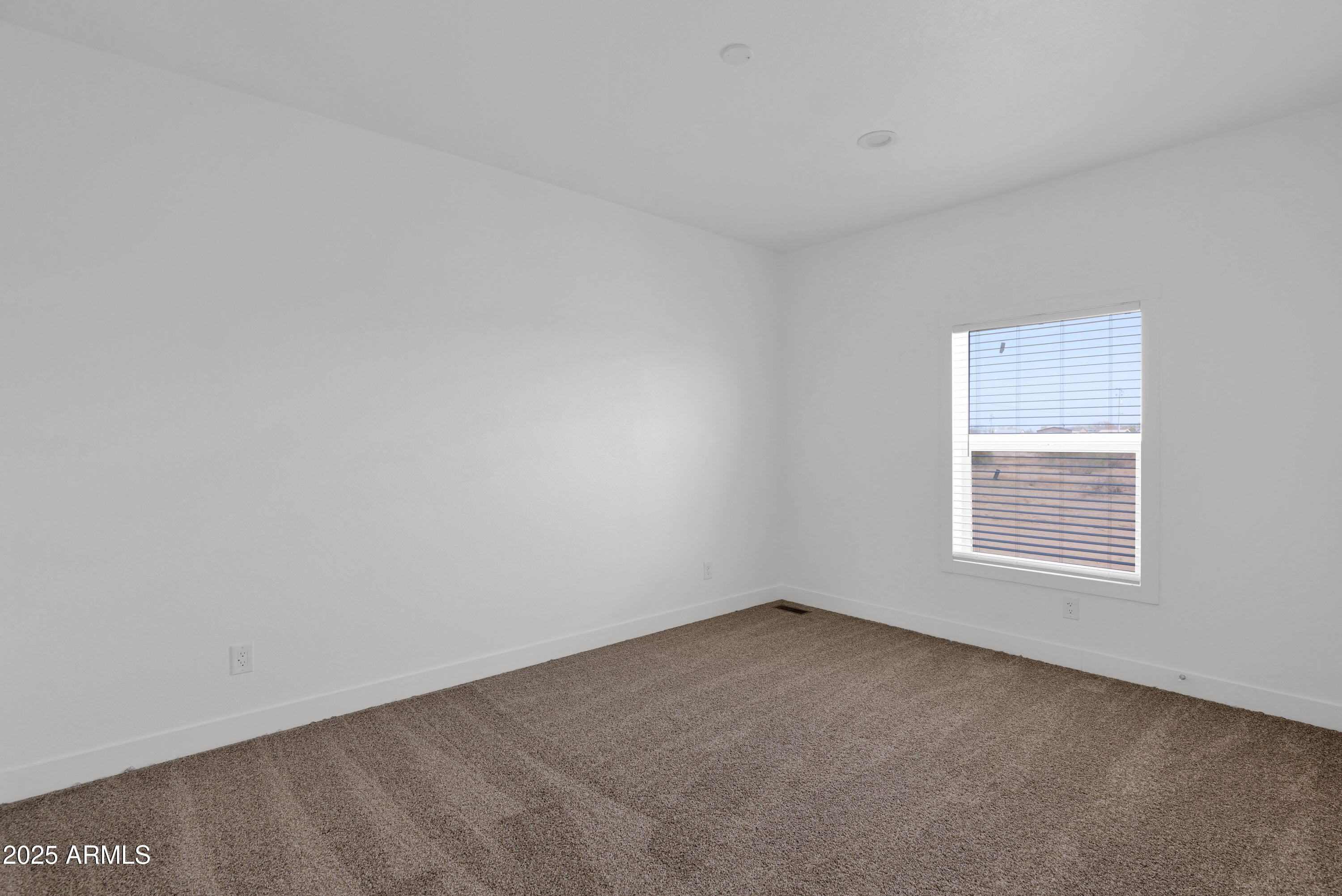 22367 North Royd Road Florence, AZ 85132 - Photo 16 of 22 a view of an empty room with a window