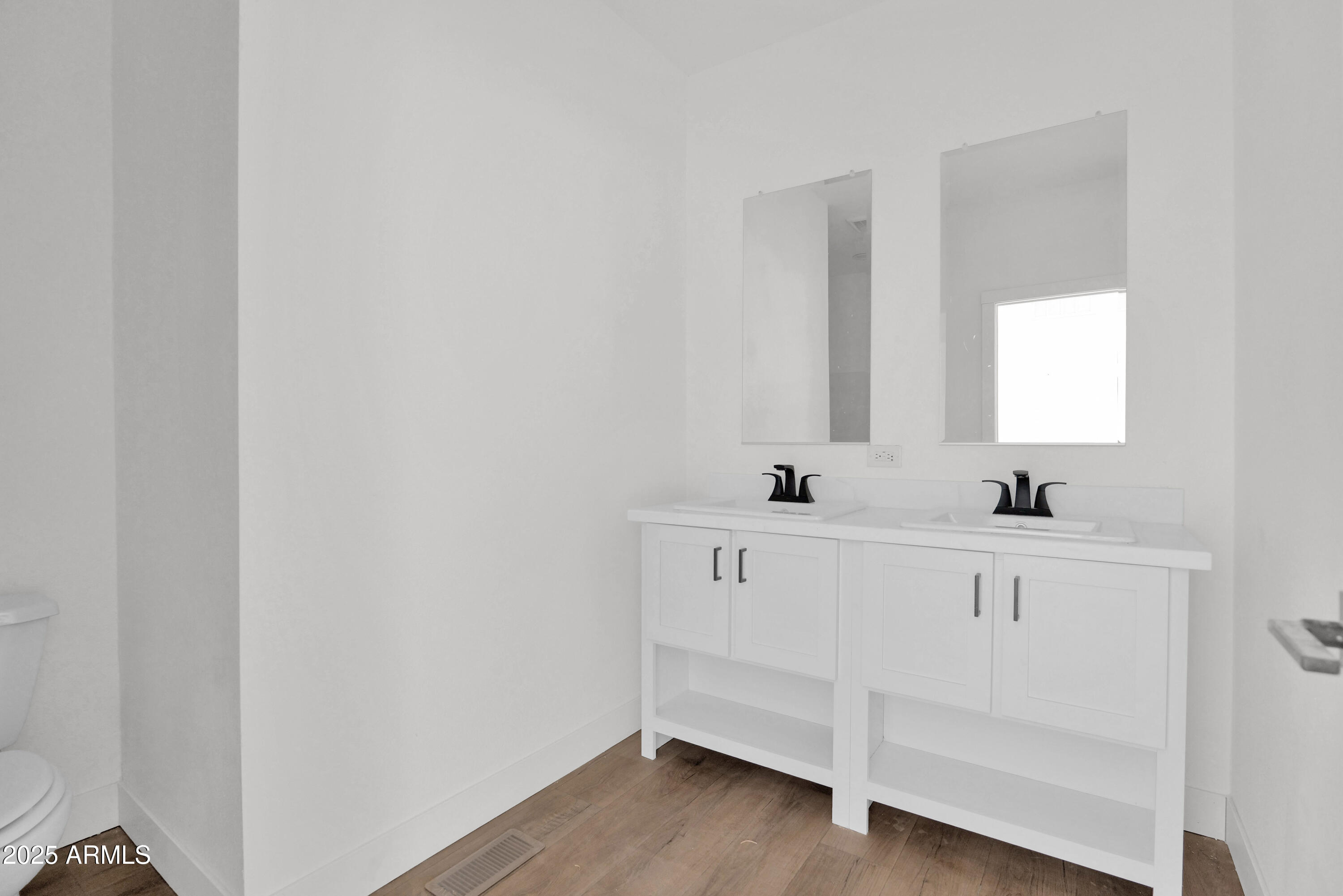 22367 North Royd Road Florence, AZ 85132 - Photo 17 of 22 a bathroom with a sink and a mirror