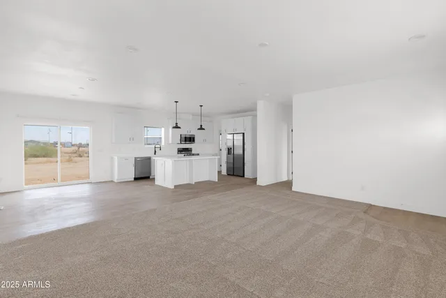 a view of a kitchen with a sink