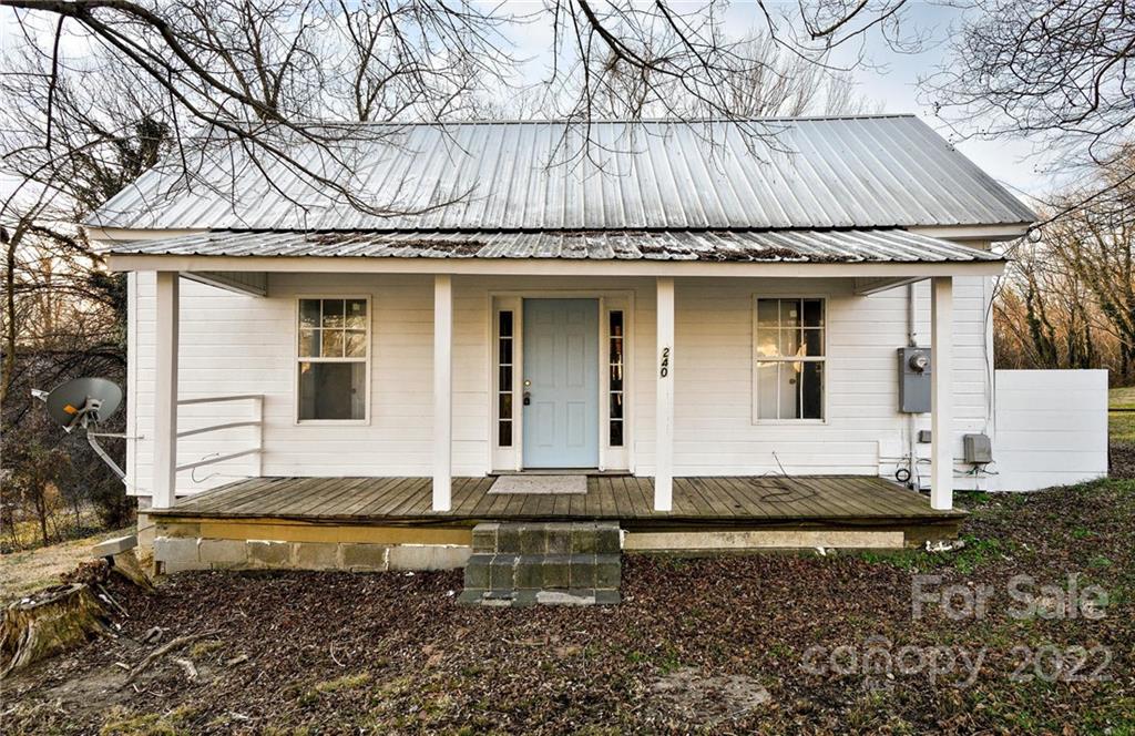a house view with a backyard
