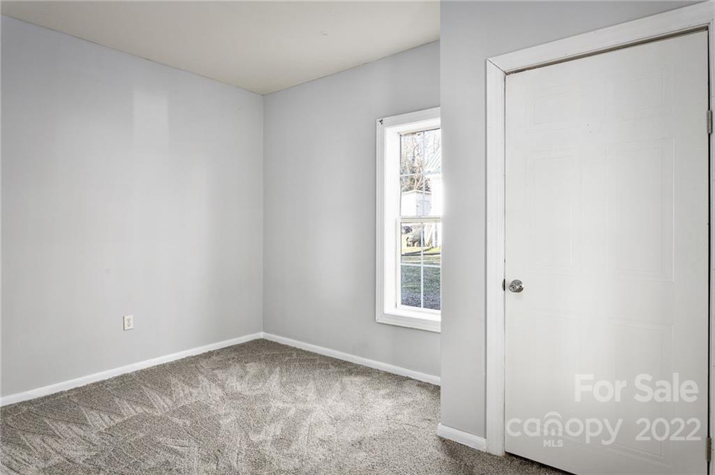 240 Duke Street Cooleemee, NC 27014 - Photo 12 of 18 an empty room with windows