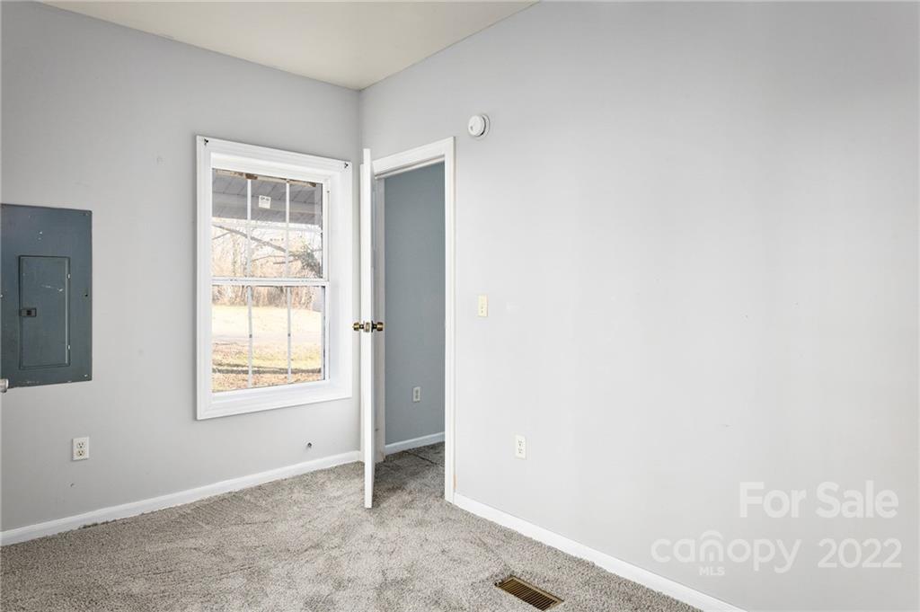 240 Duke Street Cooleemee, NC 27014 - Photo 13 of 18 an empty room with windows