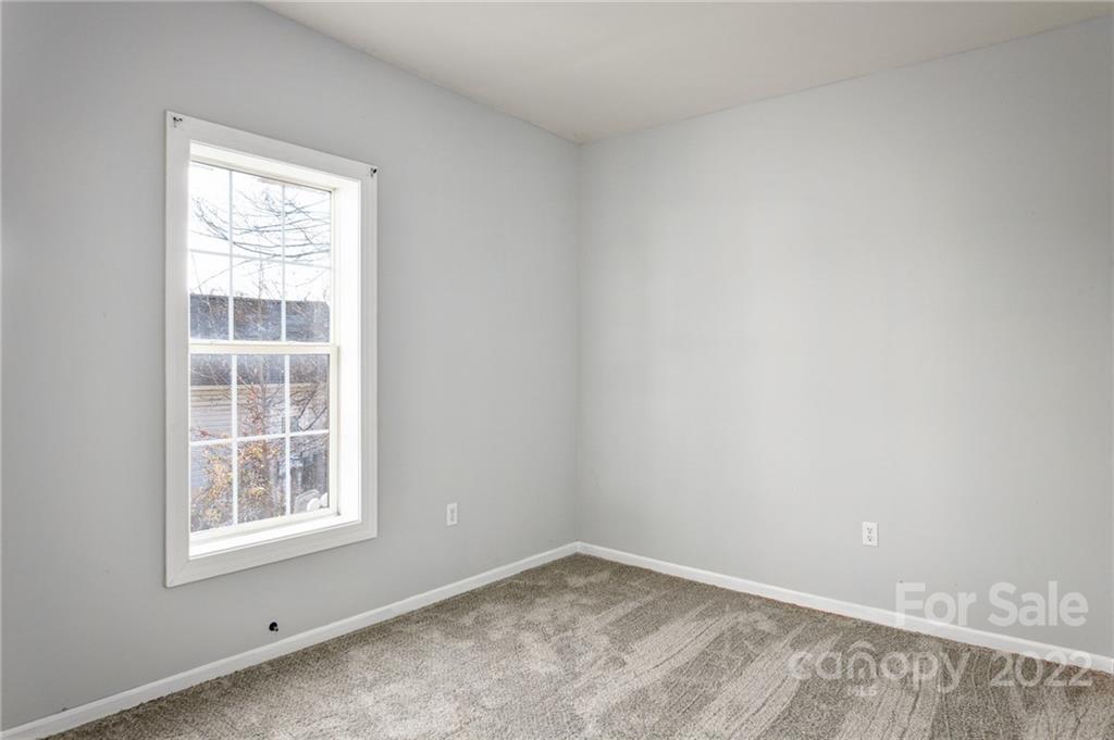 240 Duke Street Cooleemee, NC 27014 - Photo 15 of 18 an empty room with a window