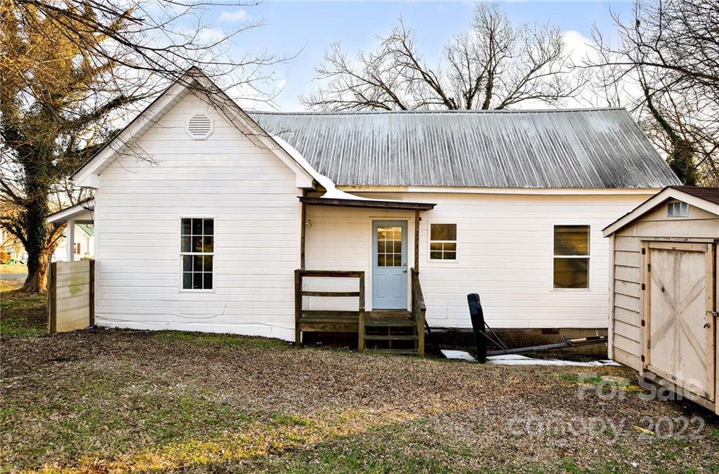 240 Duke Street Cooleemee, NC 27014 - Photo 17 of 18 a view of a house with a yard