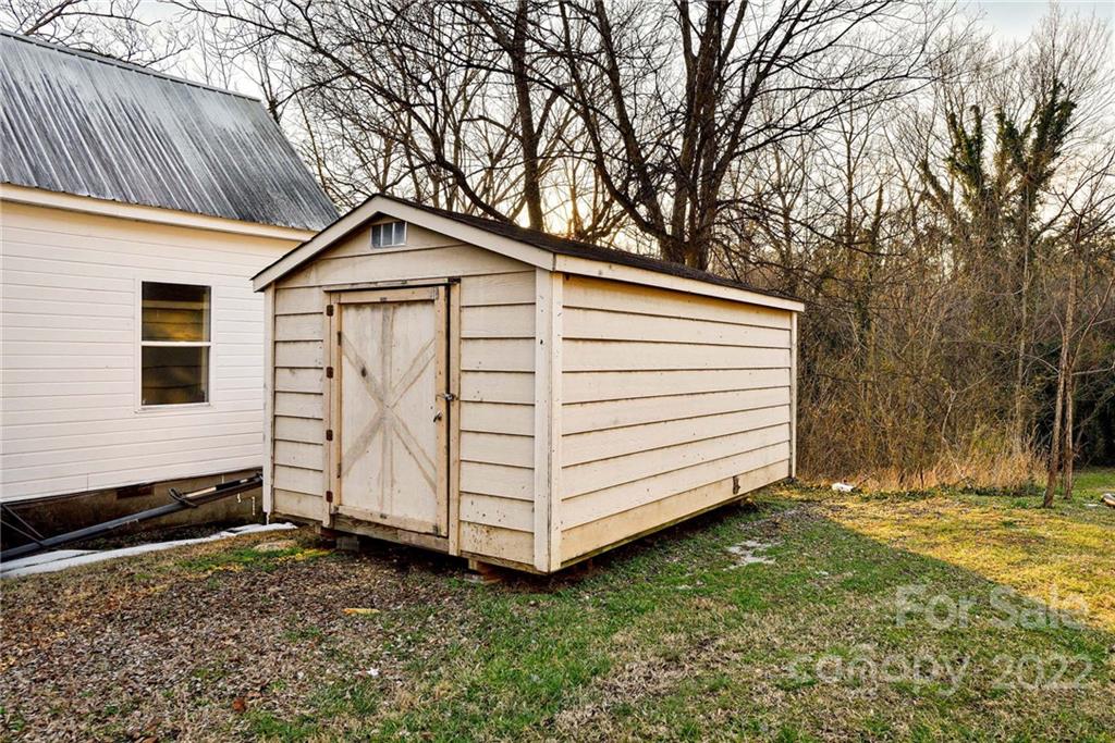 240 Duke Street Cooleemee, NC 27014 - Photo 18 of 18 a view of a house with a yard