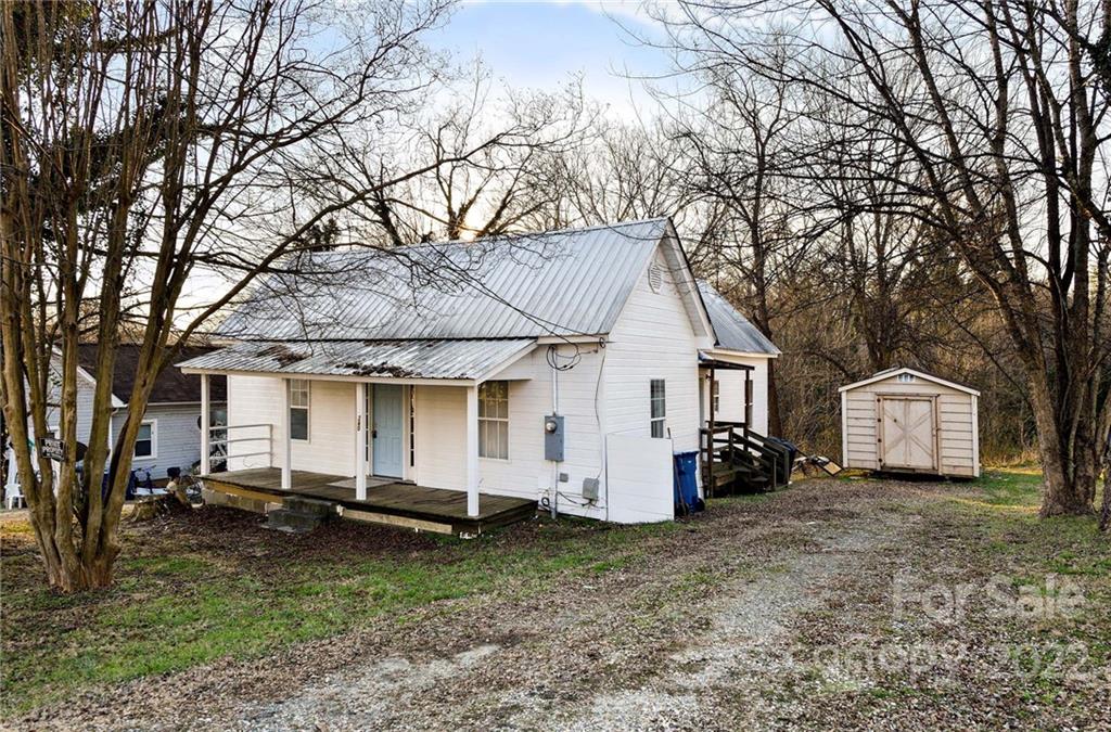 240 Duke Street Cooleemee, NC 27014 - Photo 2 of 18 a view of a house with backyard