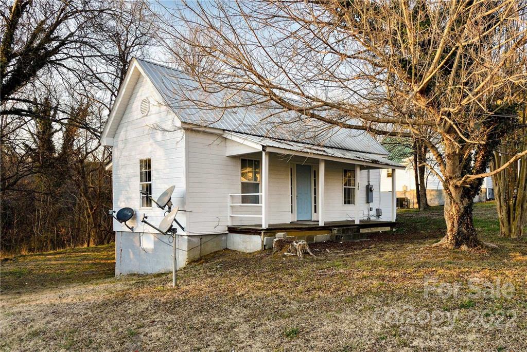 240 Duke Street Cooleemee, NC 27014 - Photo 3 of 18 a house view with a backyard space