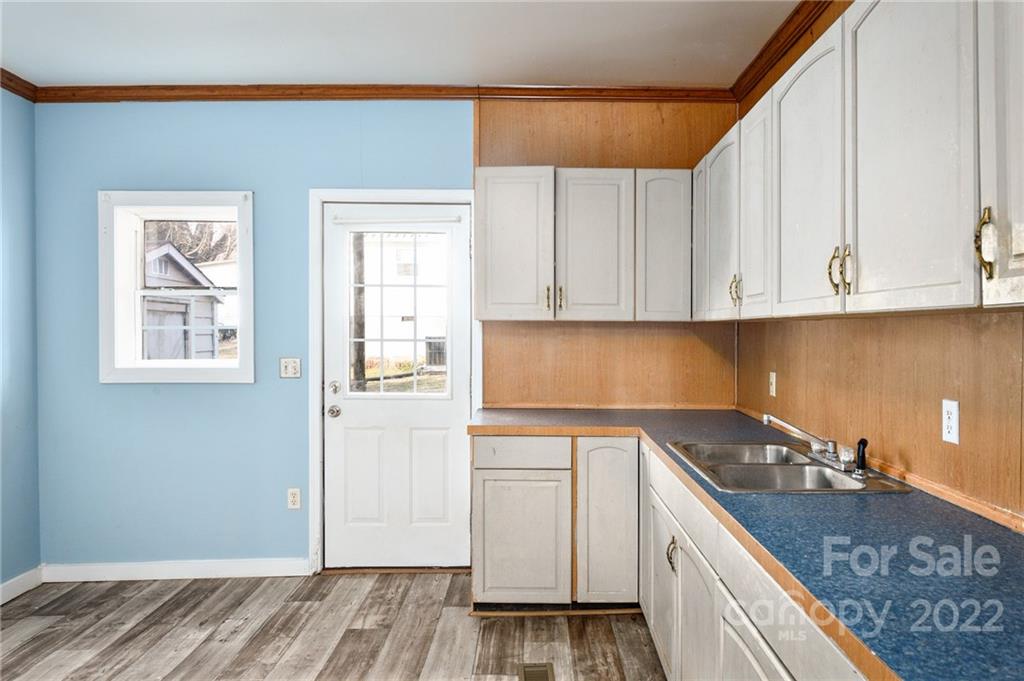 240 Duke Street Cooleemee, NC 27014 - Photo 6 of 18 a kitchen with a sink and cabinets