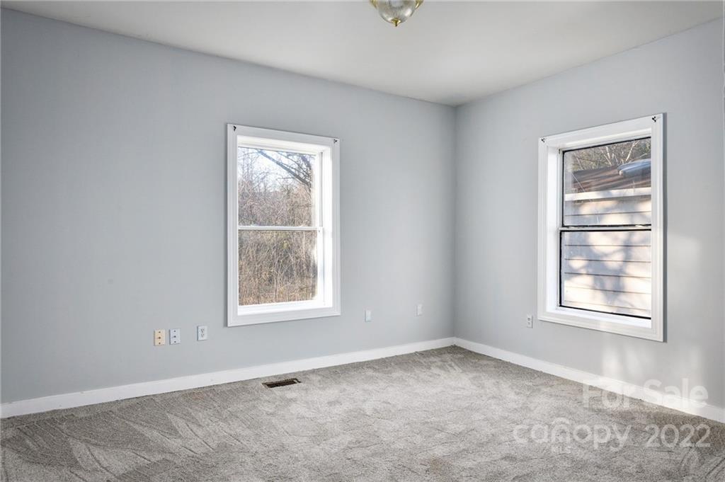 240 Duke Street Cooleemee, NC 27014 - Photo 10 of 18 an empty room with a window