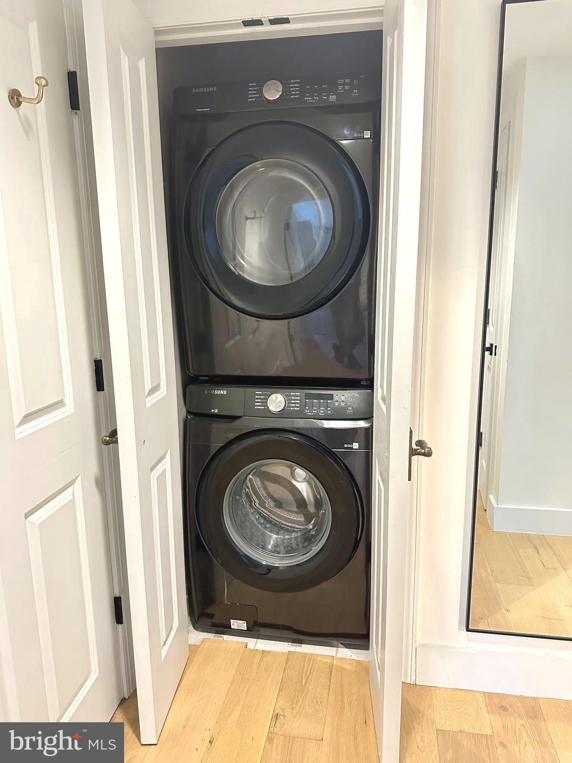 777 7th Street Northwest, Unit 322 Washington, DC 20001 - Photo 12 of 23 a utility room with dryer and washer