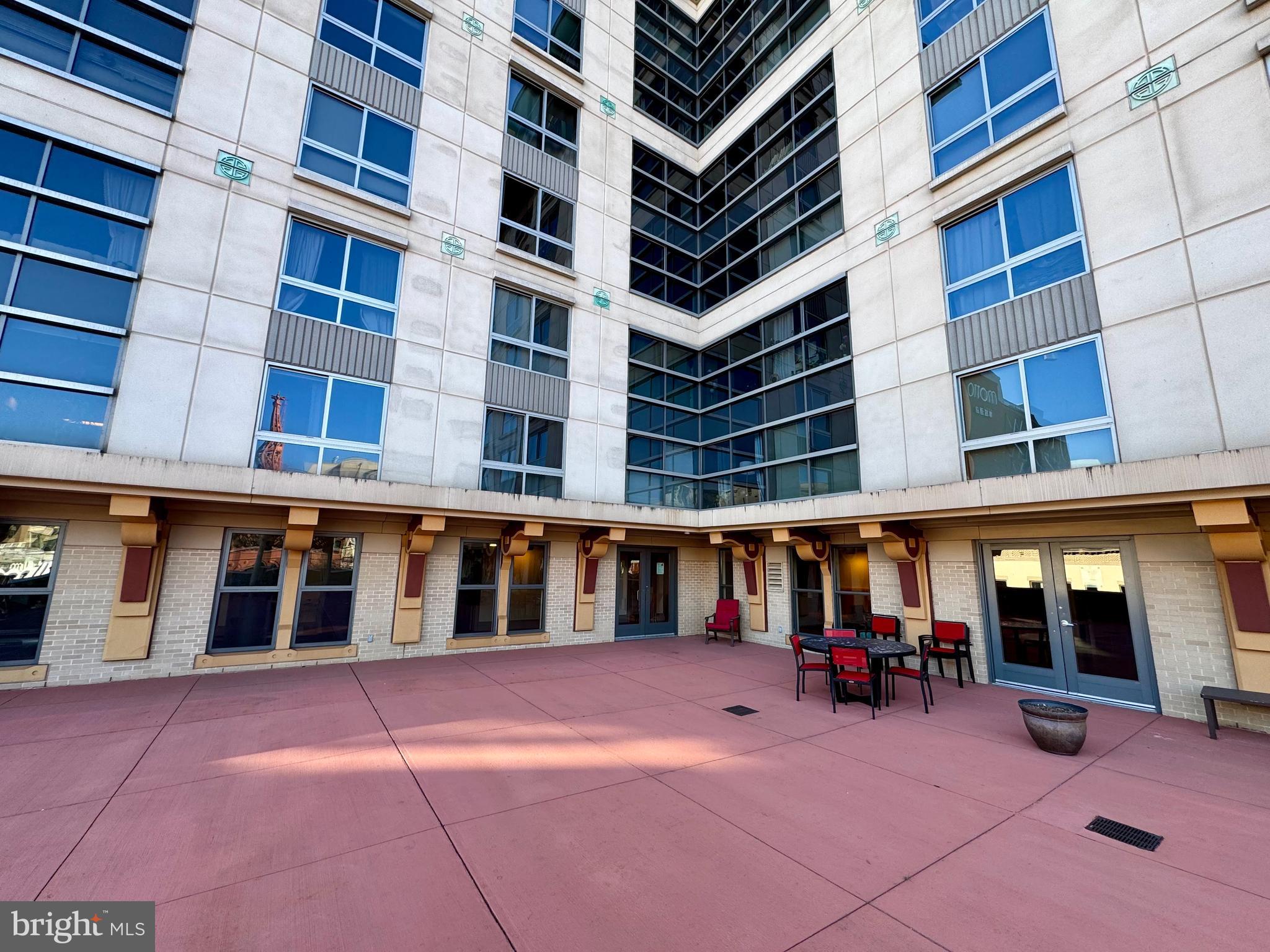 777 7th Street Northwest, Unit 322 Washington, DC 20001 - Photo 20 of 23 a view of building with large windows