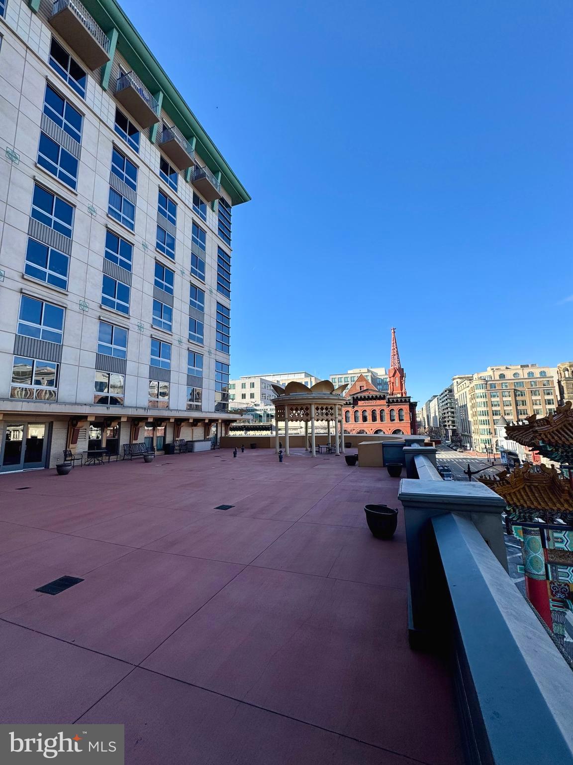 777 7th Street Northwest, Unit 322 Washington, DC 20001 - Photo 2 of 23 a view of a terrace with chairs