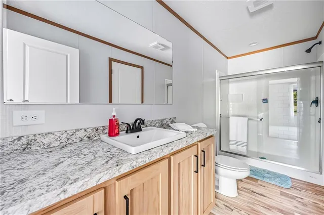 a bathroom with a sink and a toilet