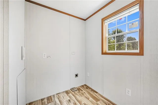 a view of room with window and closet