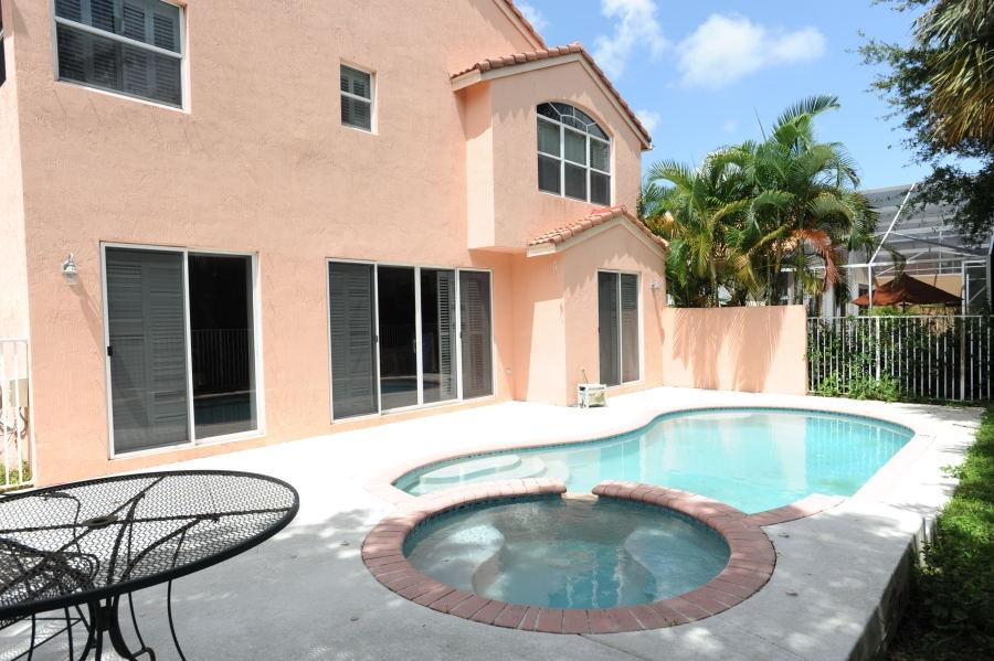 4804 South Classical Boulevard Delray Beach, FL 33445 - Photo 21 of 31 a view of outdoor space yard swimming pool and porch