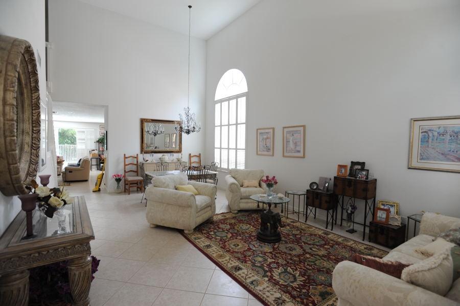 4804 South Classical Boulevard Delray Beach, FL 33445 - Photo 3 of 31 a living room with furniture and wooden floor