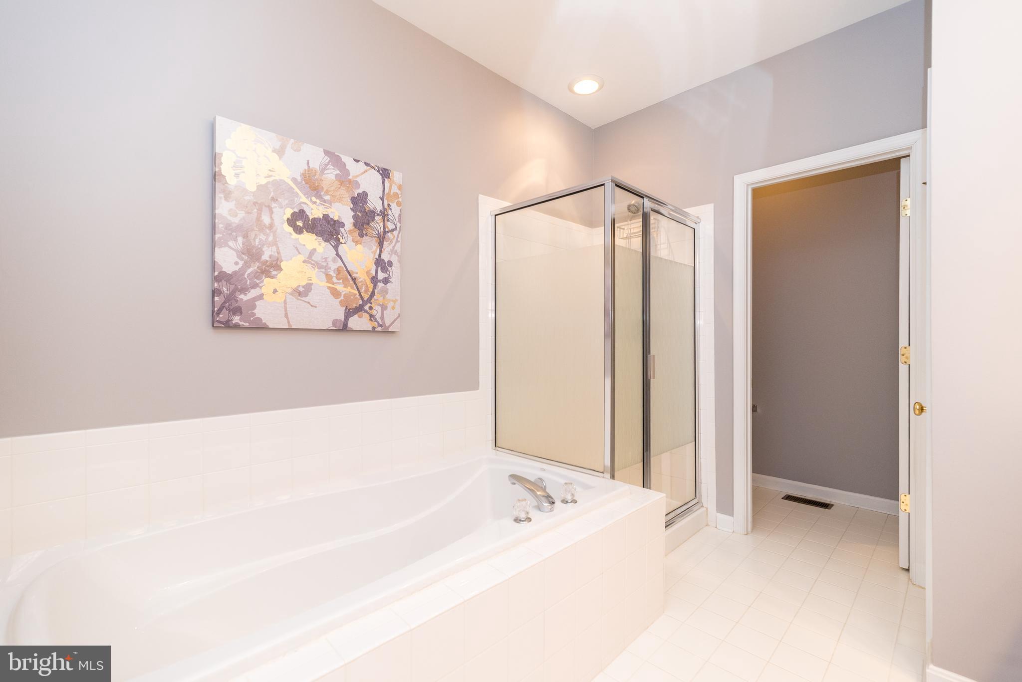 32 Addison Court Doylestown, PA 18901 - Photo 34 of 64 Primary bathroom with soaking tub and shower