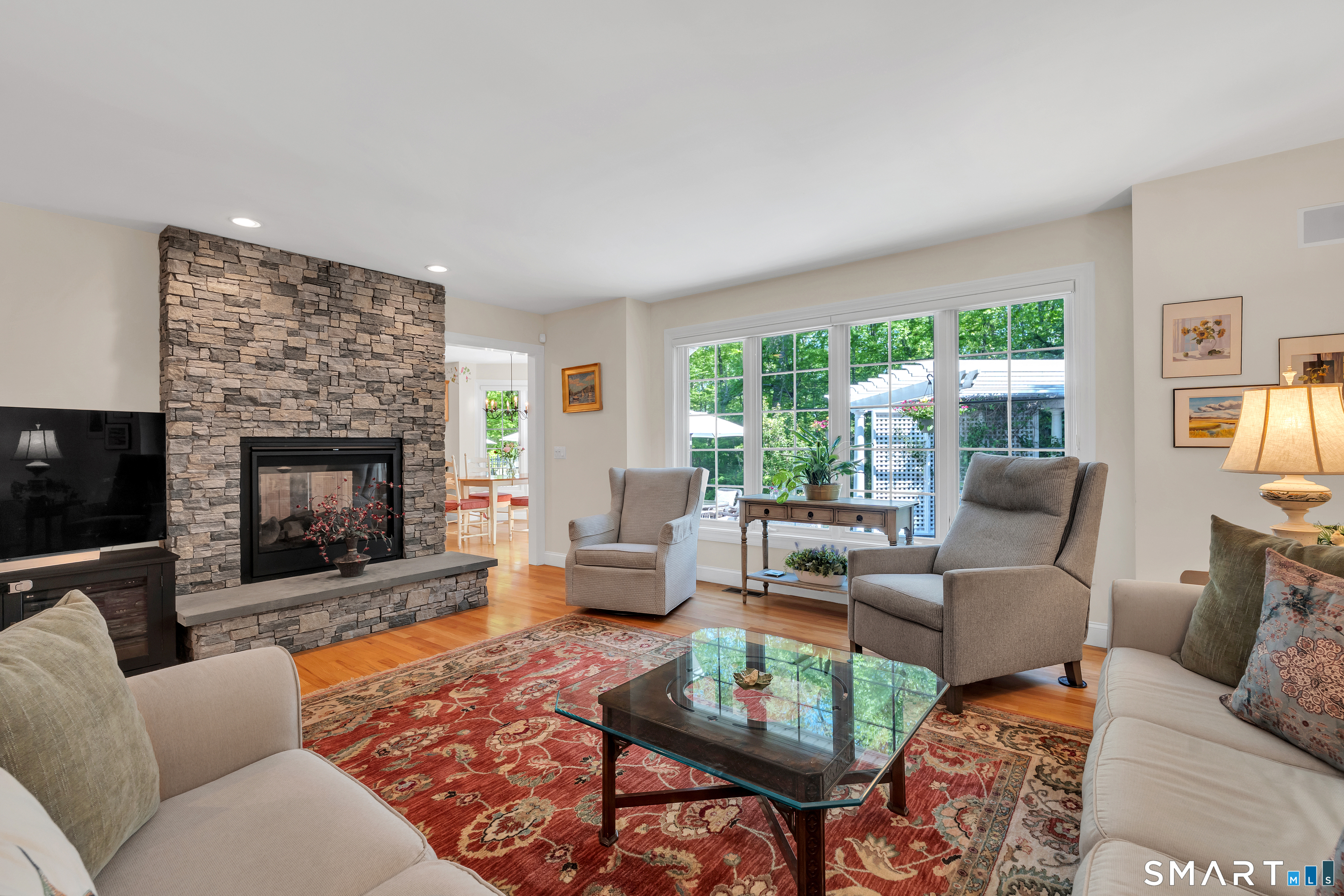 21 Stone Wall Road Salem, CT 06420 - Photo 8 of 38 a living room with furniture and a fireplace