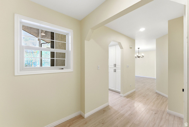 1041 West Grindelwald Court, Unit R5 Midway, UT 84049 - Photo 12 of 44 Midway condo entryway with durable flooring, coat storage, and clean transition into open living space