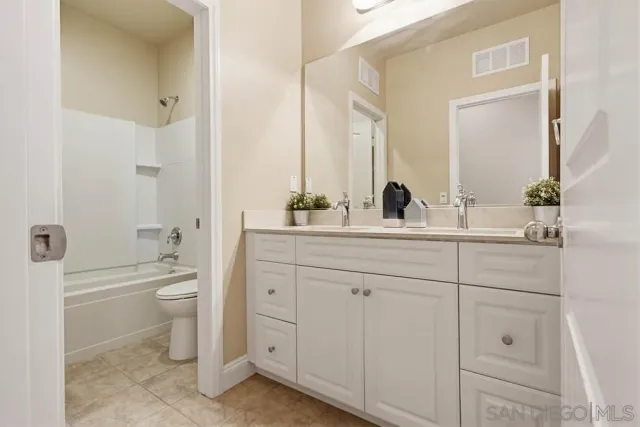 a view of staircase with white walls