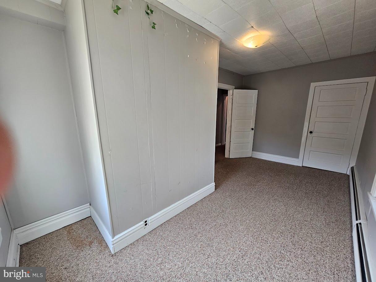 69 North Water Street Lititz, PA 17543 - Photo 10 of 14 Spacious room with neutral tones and light.