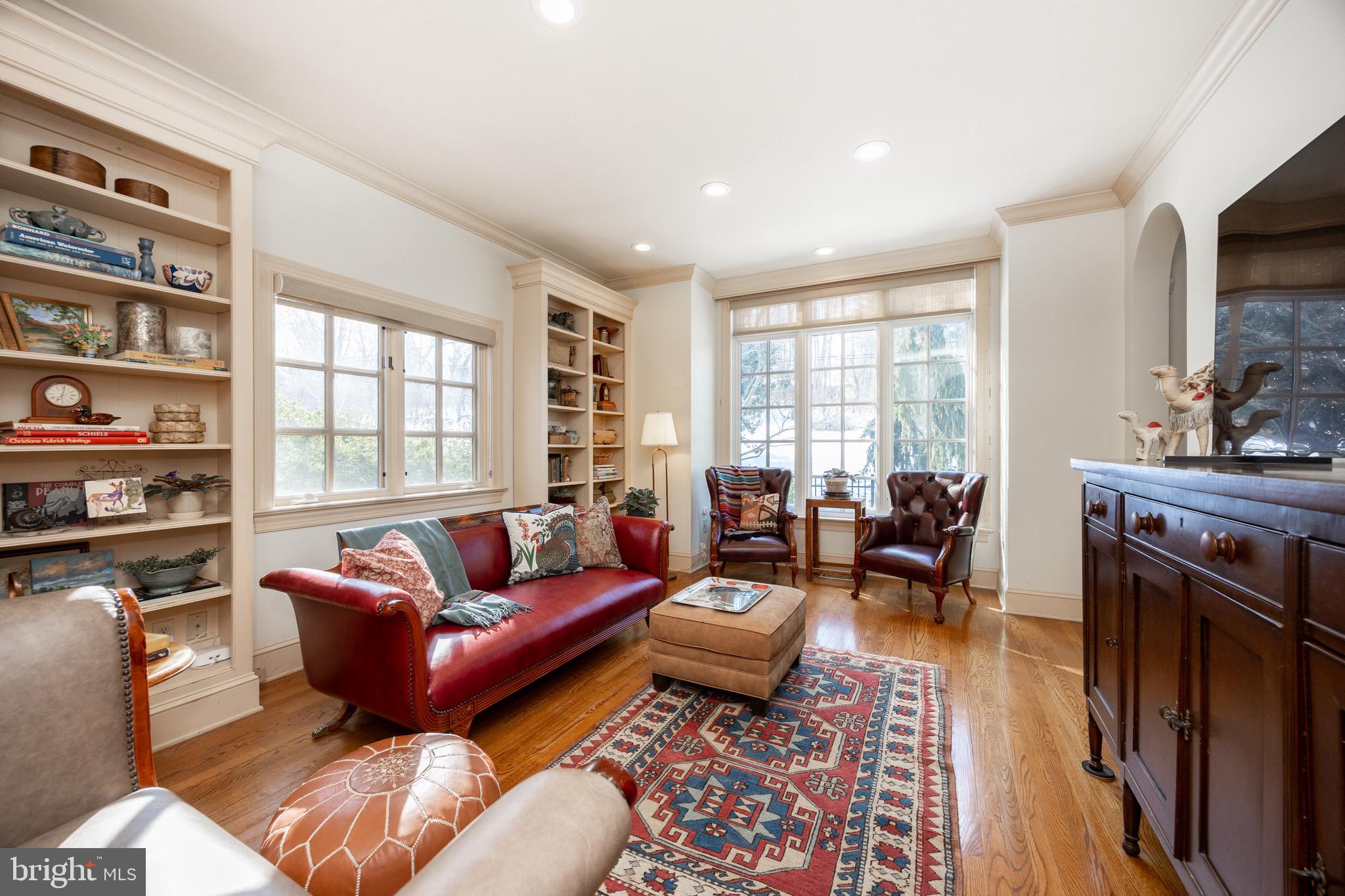 2220 Bodine Road Malvern, PA 19355 - Photo 16 of 86 a living room with furniture fireplace and a large window