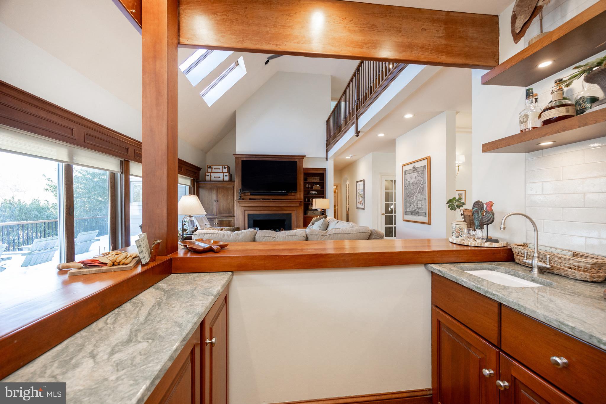 2220 Bodine Road Malvern, PA 19355 - Photo 28 of 86 a view of a kitchen with kitchen island a sink and a large window