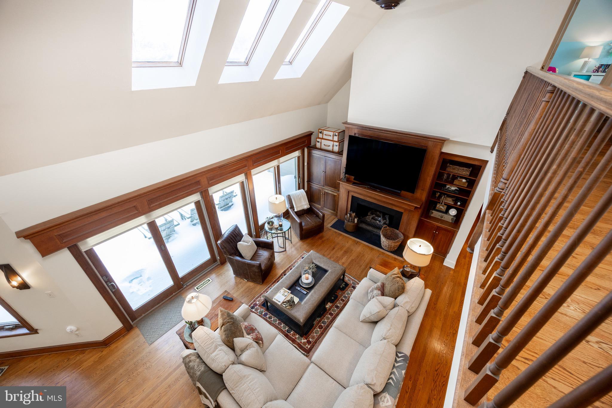 2220 Bodine Road Malvern, PA 19355 - Photo 32 of 86 a living room with furniture and a flat screen tv