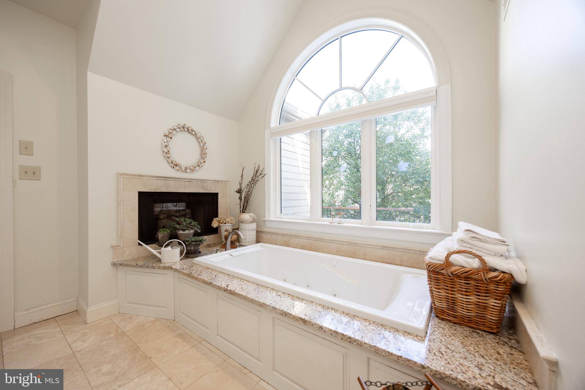 2220 Bodine Road Malvern, PA 19355 - Photo 36 of 86 a spacious bathroom with a tub and a large window