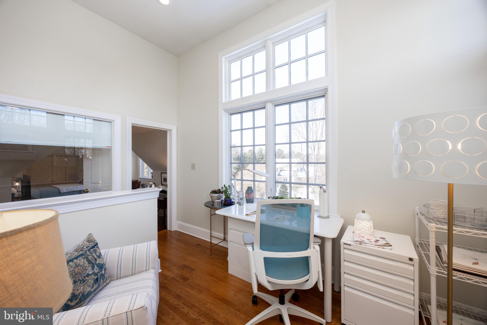 2220 Bodine Road Malvern, PA 19355 - Photo 47 of 86 a living room with furniture a flat screen tv and a large window