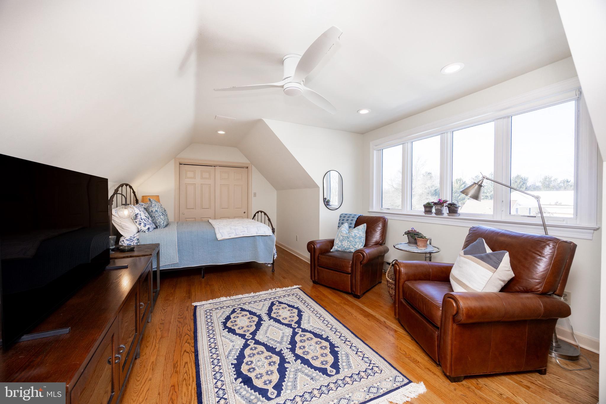 2220 Bodine Road Malvern, PA 19355 - Photo 54 of 86 a living room with furniture and a flat screen tv