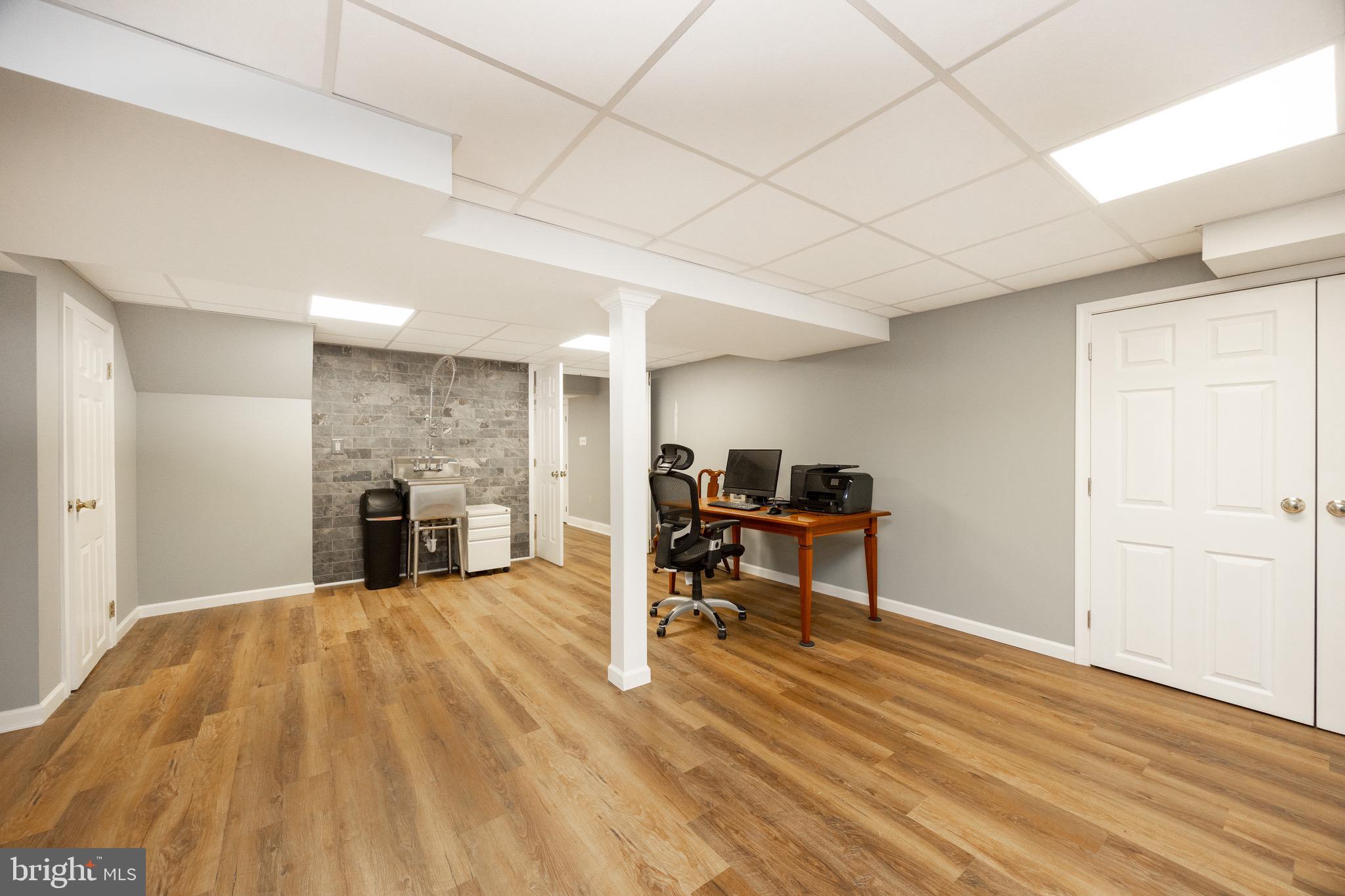 2220 Bodine Road Malvern, PA 19355 - Photo 65 of 86 a view of livingroom with furniture and fireplace