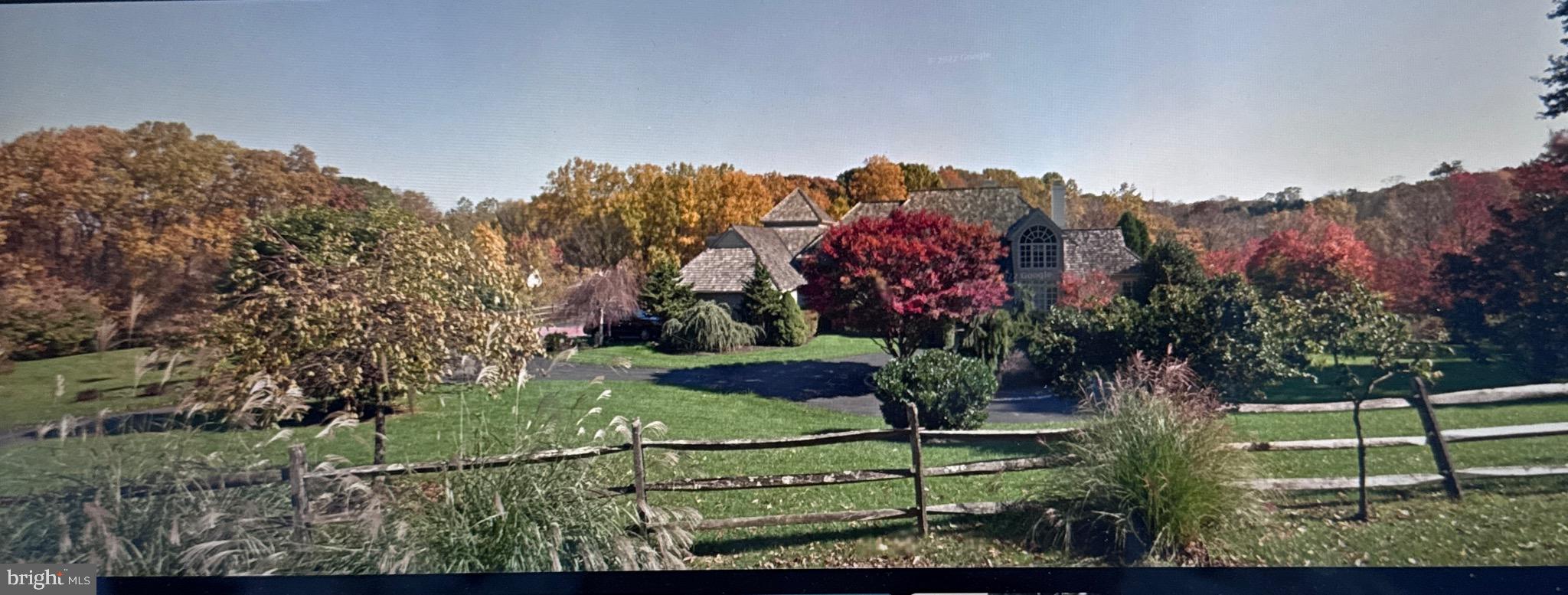 2220 Bodine Road Malvern, PA 19355 - Photo 9 of 86 a view of a house with a yard and a large tree
