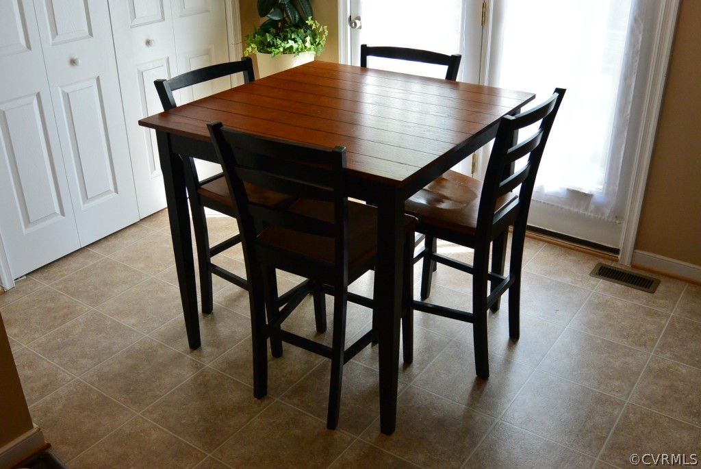 3141 Quaker Road Quinton, VA 23141 - Photo 5 of 12 a dining room with furniture and wooden floor