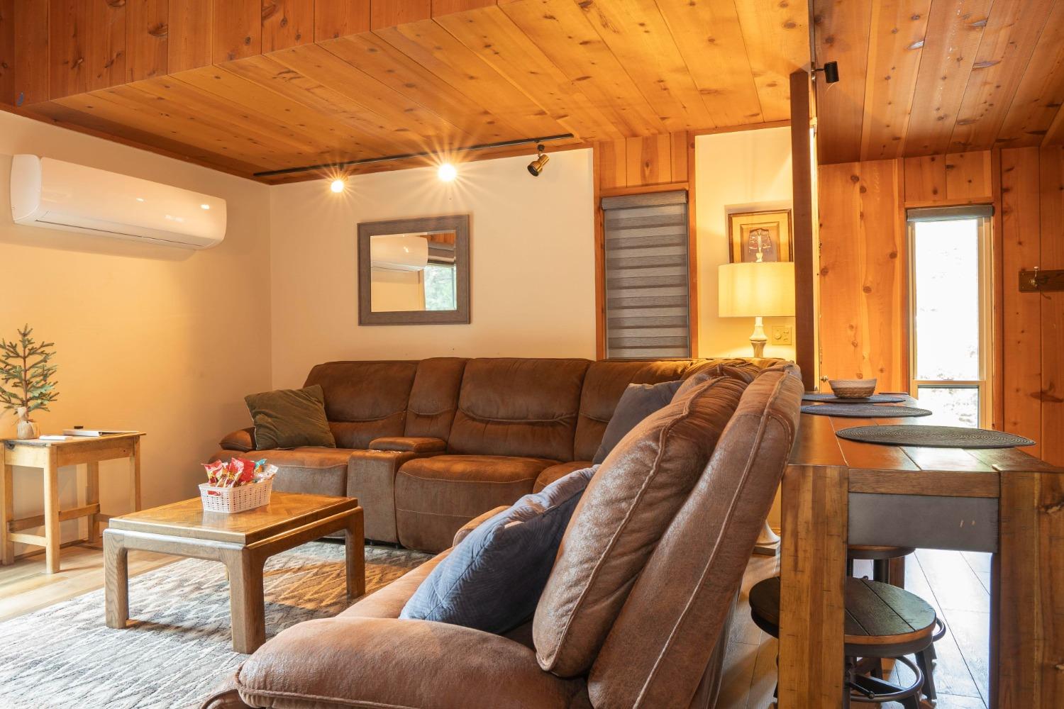42135 Hanging Branch Road Shaver Lake, CA 93664 - Photo 24 of 55 a living room with furniture and a large window