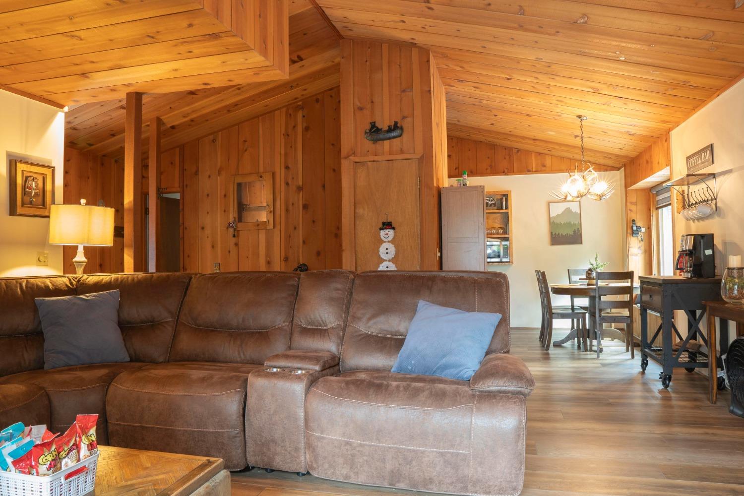 42135 Hanging Branch Road Shaver Lake, CA 93664 - Photo 29 of 55 a living room with furniture and wooden floor