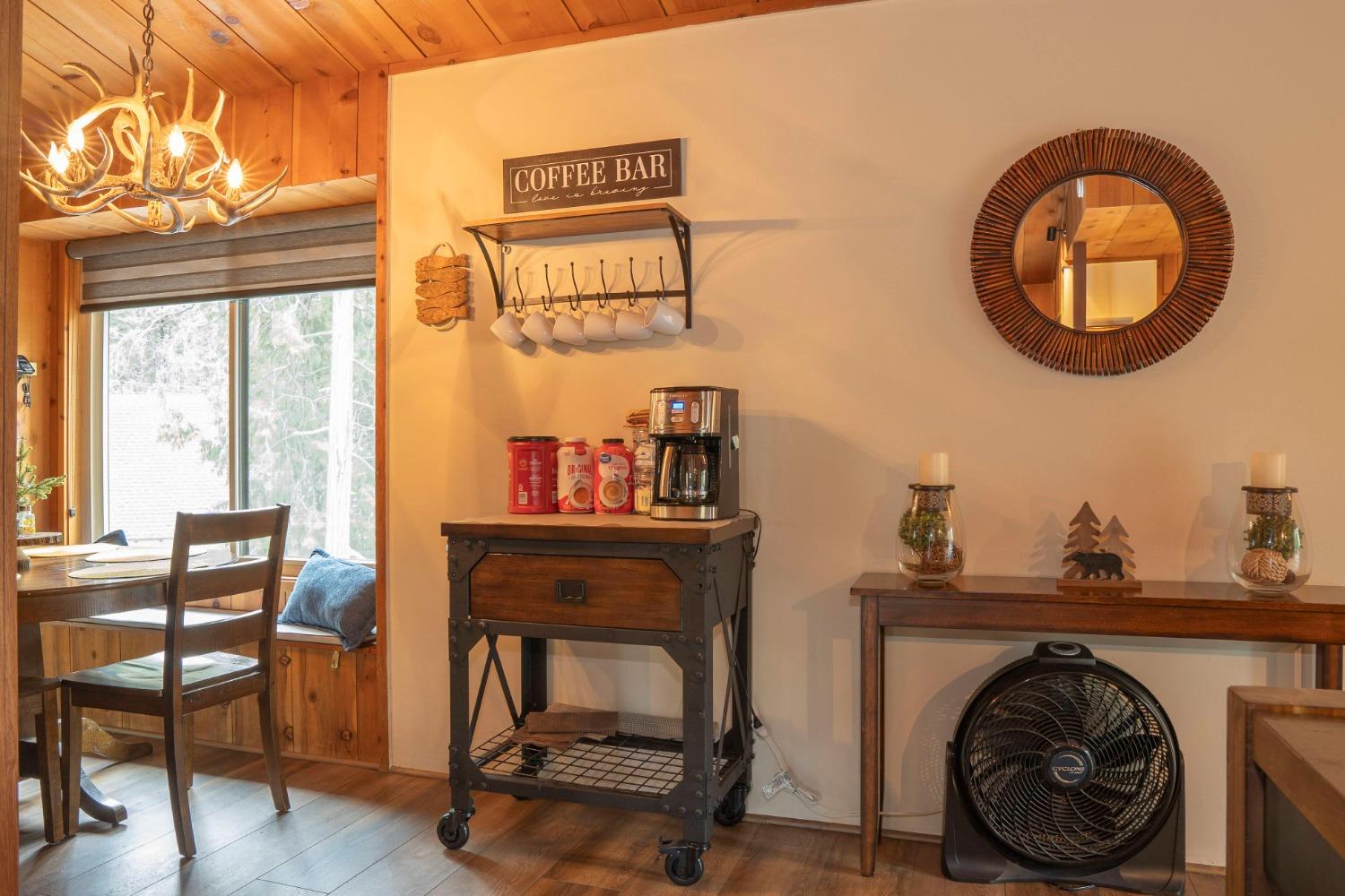 42135 Hanging Branch Road Shaver Lake, CA 93664 - Photo 30 of 55 a living room with furniture and a fireplace