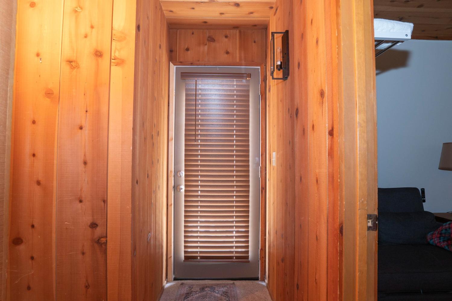 42135 Hanging Branch Road Shaver Lake, CA 93664 - Photo 45 of 55 a view of a wooden door