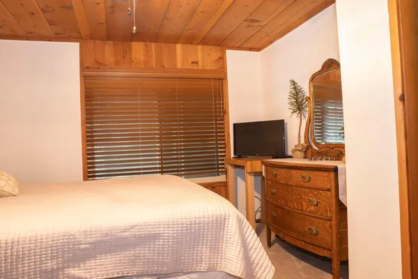 a living room with furniture and a gate