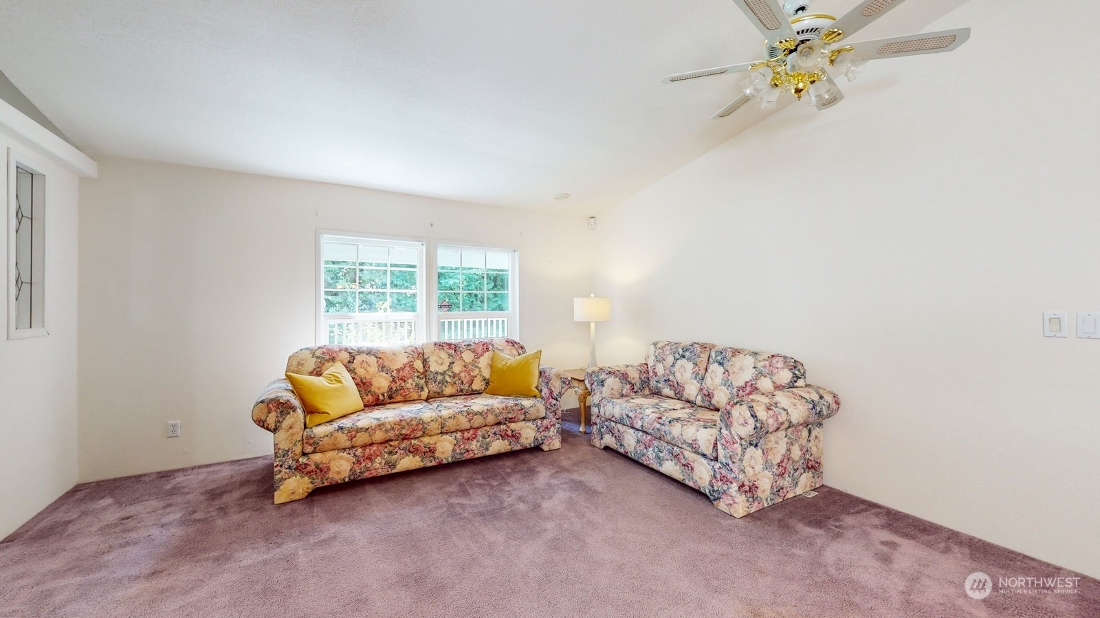 5507 189th Street Southeast Bothell, WA 98012 - Photo 16 of 37 a living room with furniture and a window