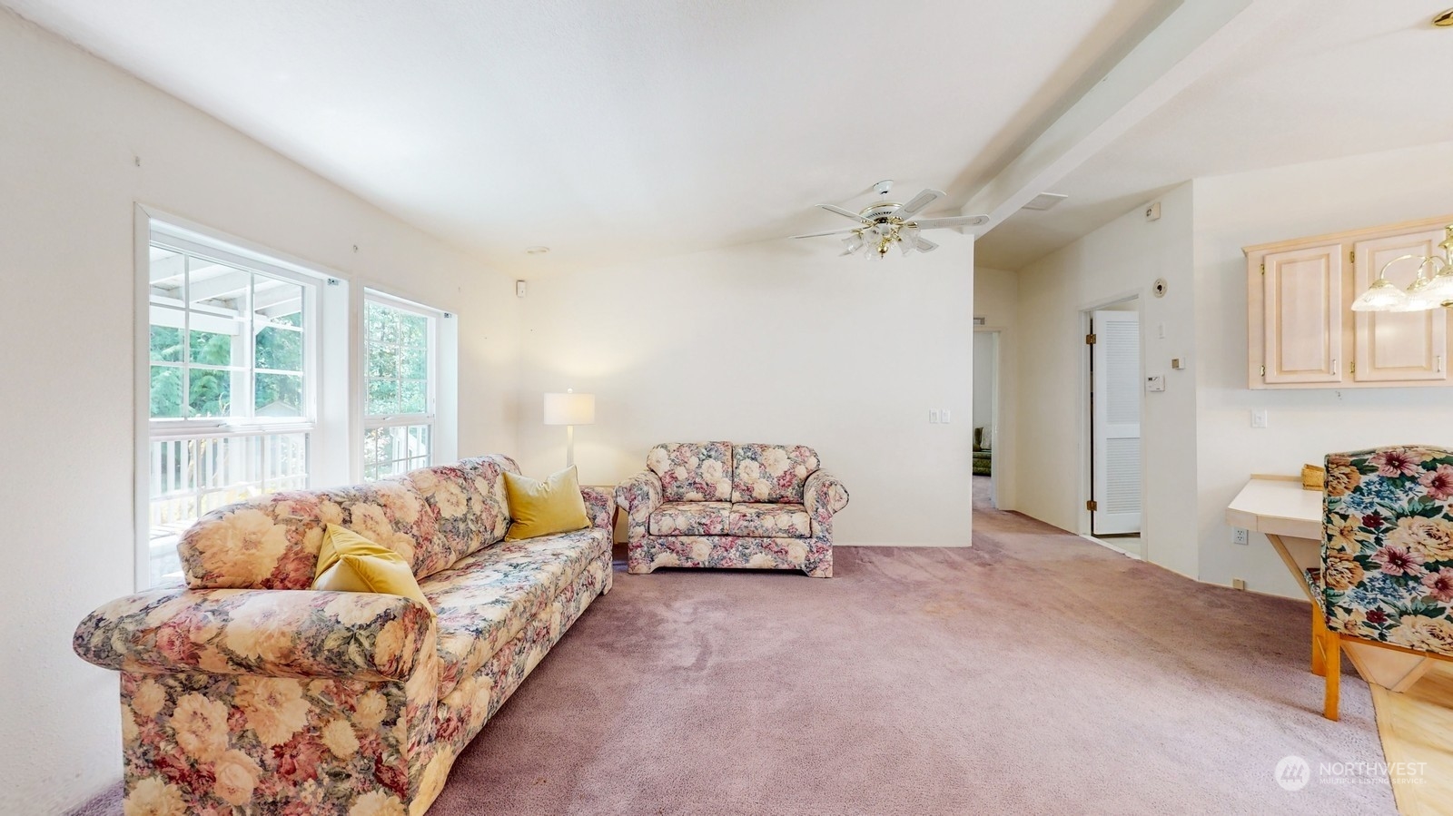 5507 189th Street Southeast Bothell, WA 98012 - Photo 17 of 37 a living room with furniture and a window
