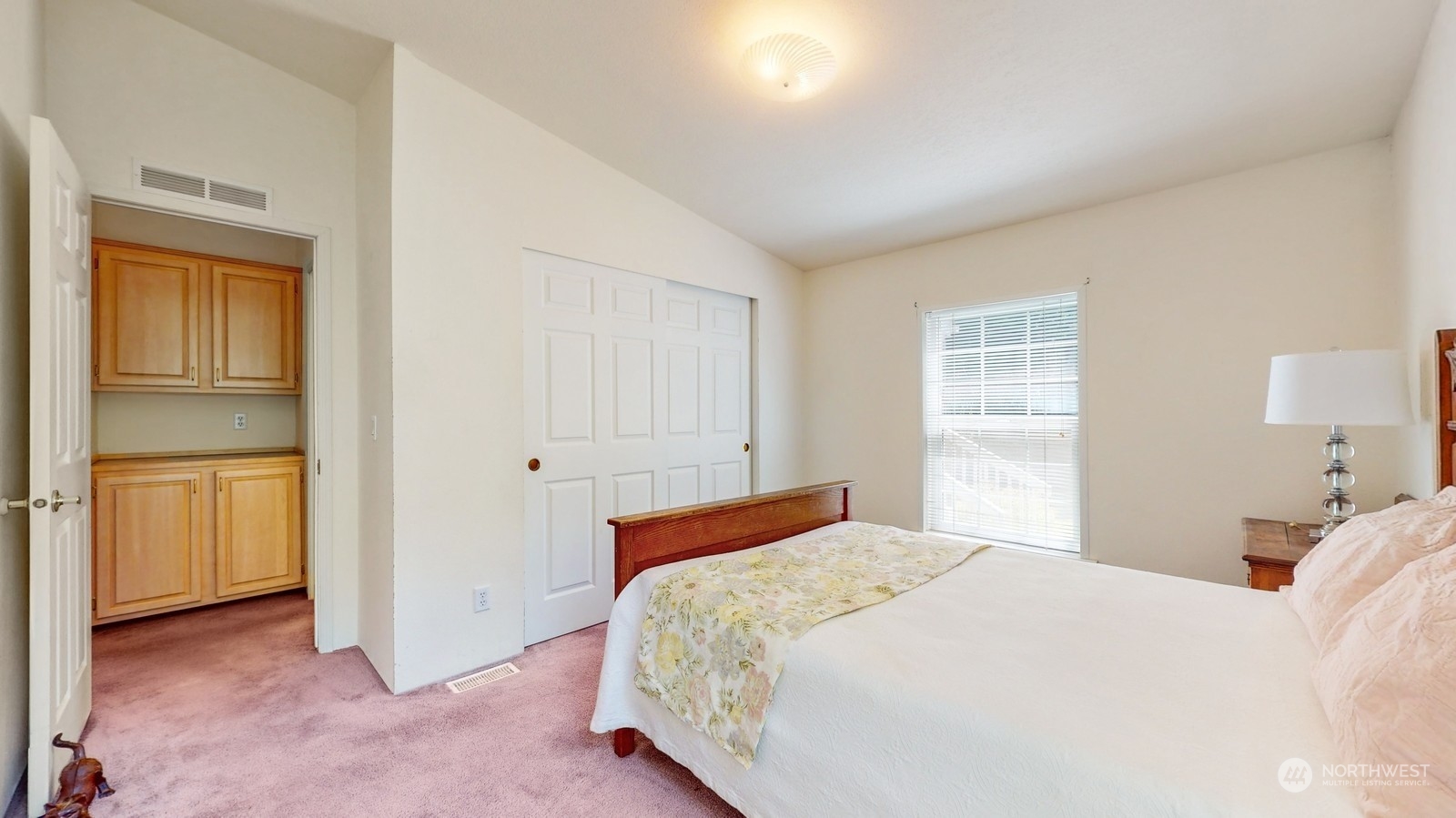 5507 189th Street Southeast Bothell, WA 98012 - Photo 20 of 37 a bedroom with a bed and a closet